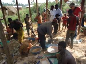 Crushing and mercury processing of gold in a small roadside hut.